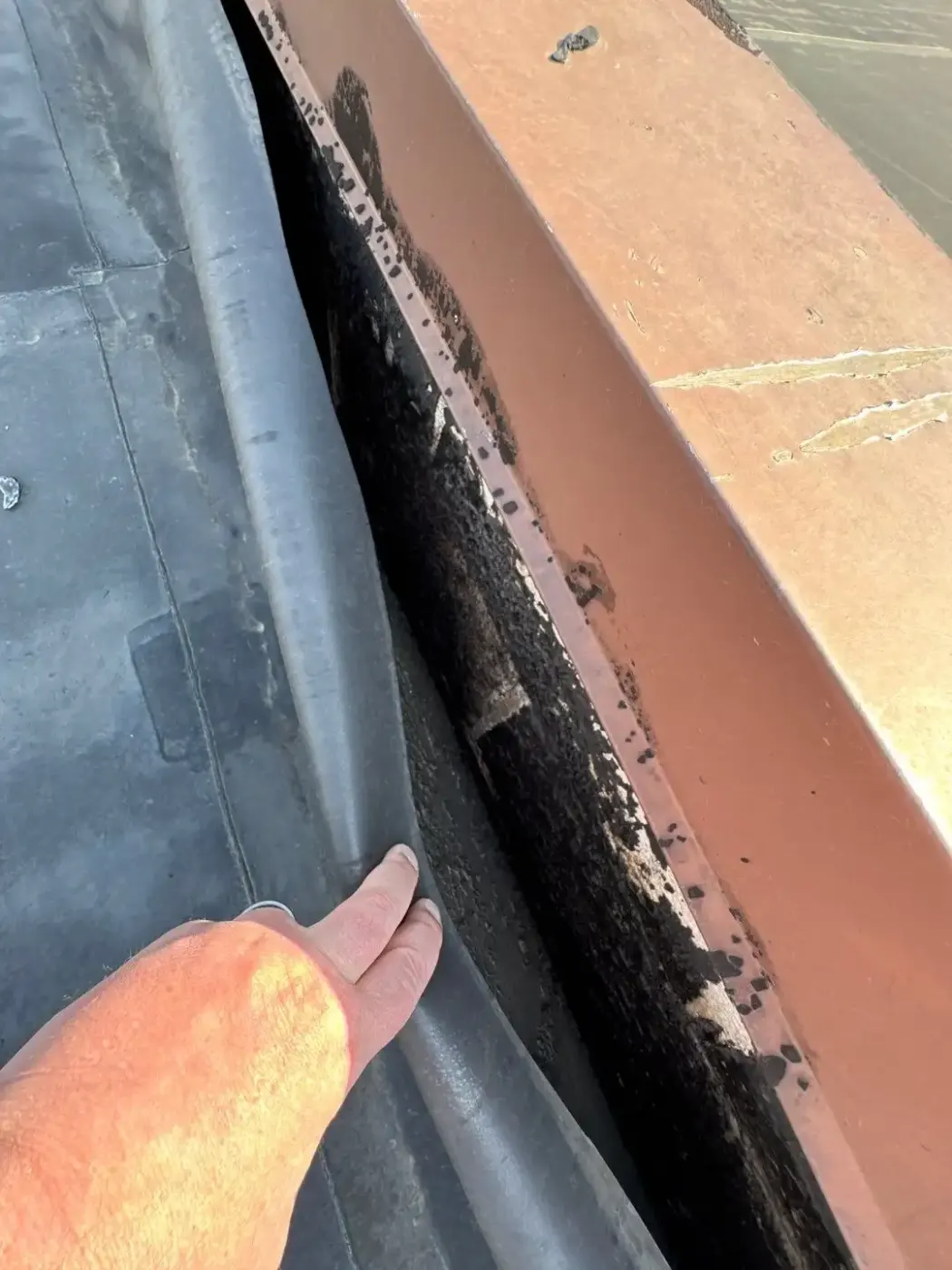 Tarping and dry-in on a Cicero commercial roof